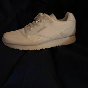 All white Reebok Classics, size 9 women’s